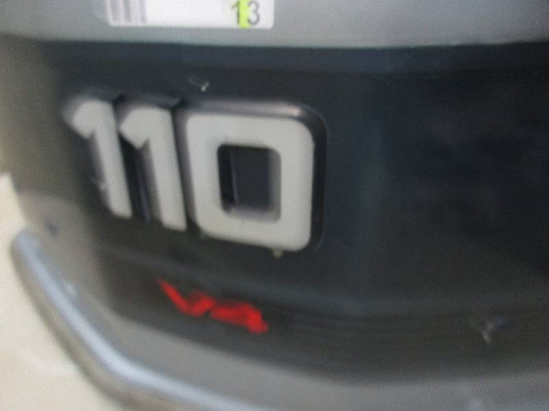lot 13 image: 110 hp Evinrude VRO outboard motor cover