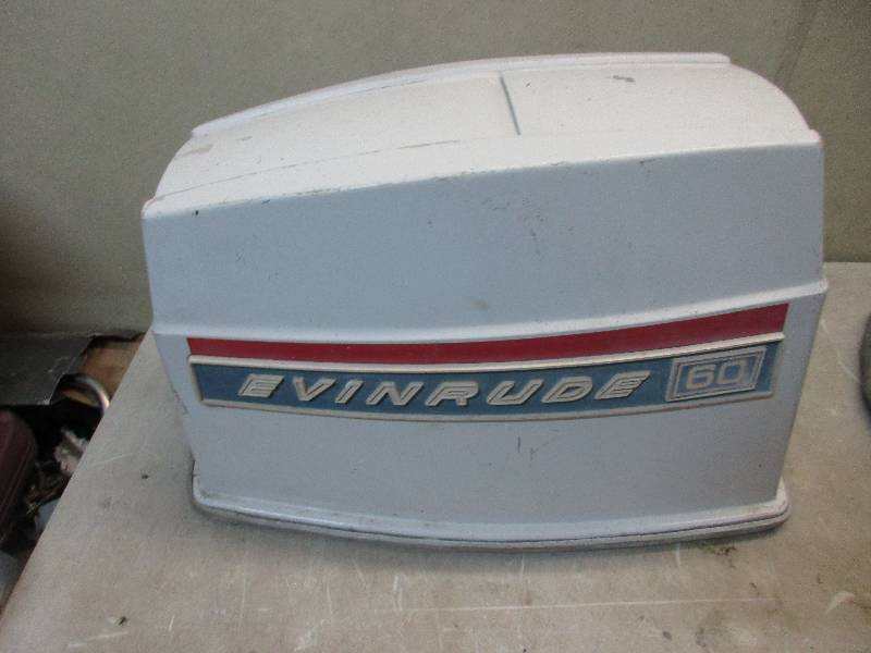 lot 14 image: 60 hp Evinrude outboard motor cover