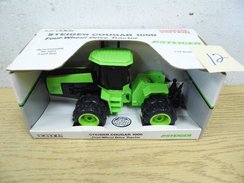lot 12 image: Ertl Steiger Cougar 100 Tractor