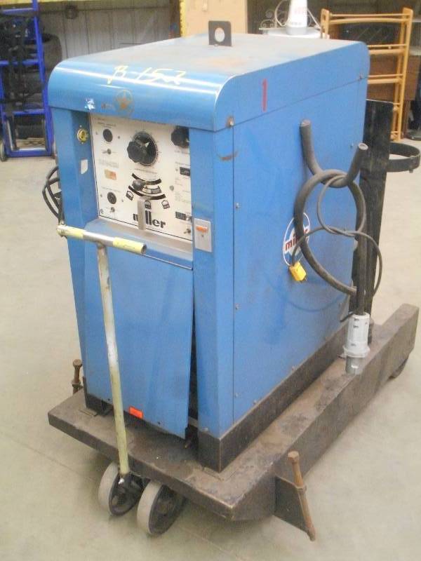 lot 12 image: Miller Model 330ABP Commercial 330...