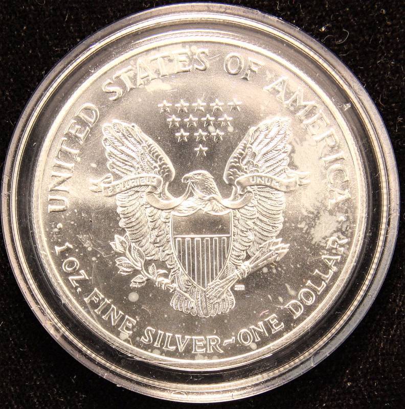 1999 AMERICAN SILVER EAGLE 1 TROY OZ. .999 FINE SILVER IN AIRTITE HOLDER COLORIZED