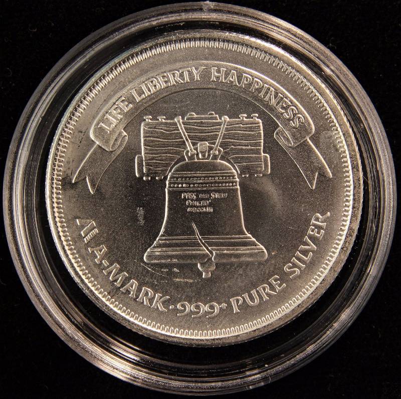 1 TROY OZ. .999 FINE SILVER A-MARK LIBERTY ROUND IN AIRTITE HOLDER