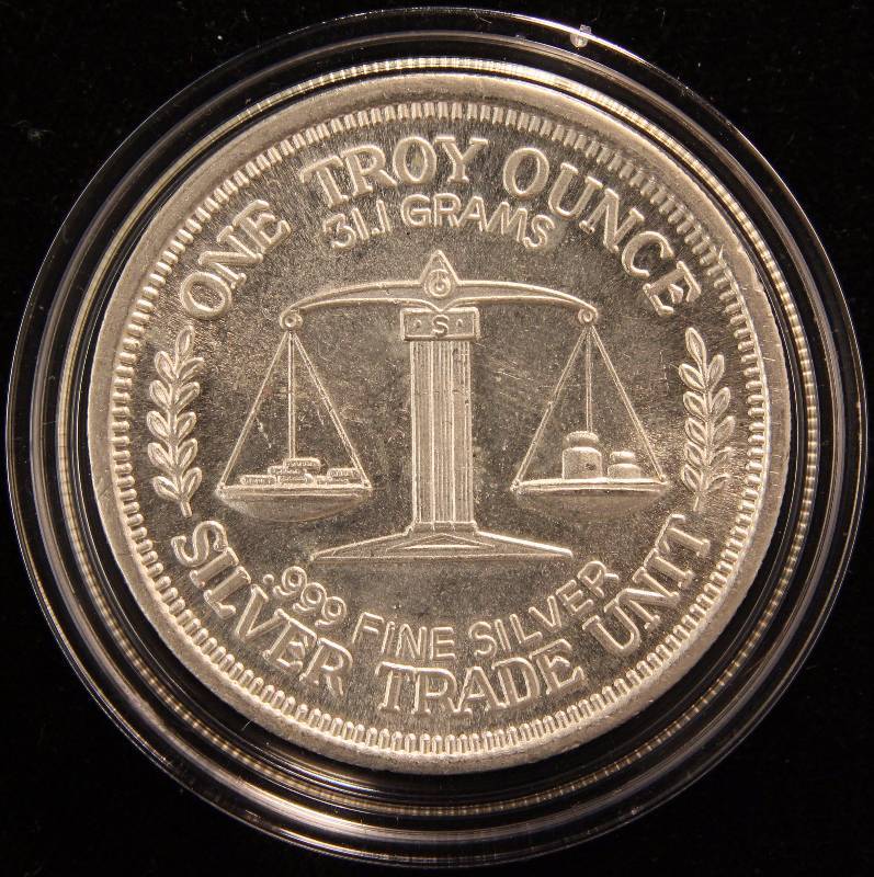 1 TROY OZ. .999 FINE SILVER TRADE UNIT 1984 MORGAN DESIGN IN AIRTITE HOLDER