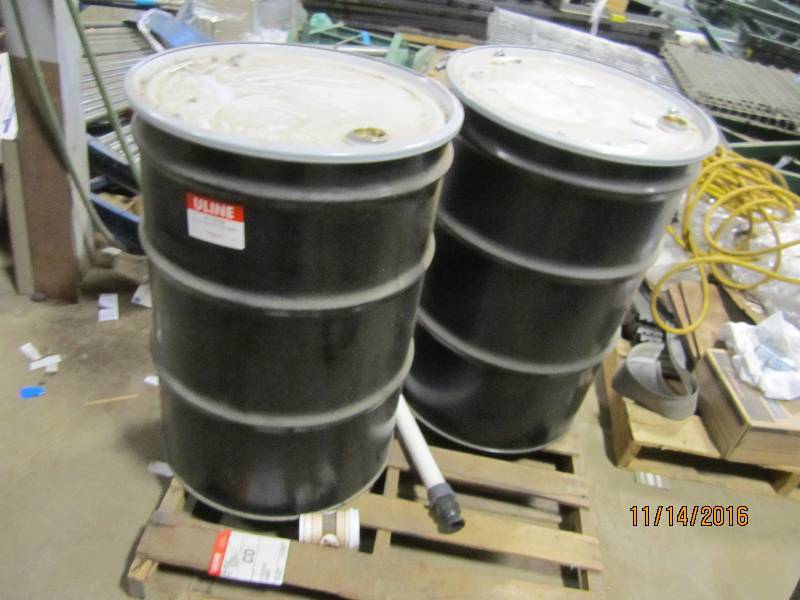 2 55 gallon open top steel drums...
