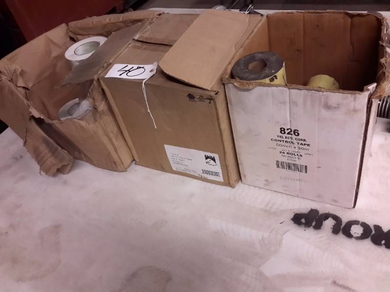 lot 40 image: 1 12 Cases of White Poly Tape  12 Case of Control Tape