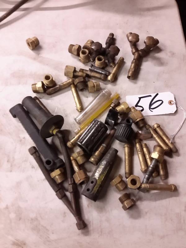 lot 56 image: Misc. Valve parts and pieces as shown