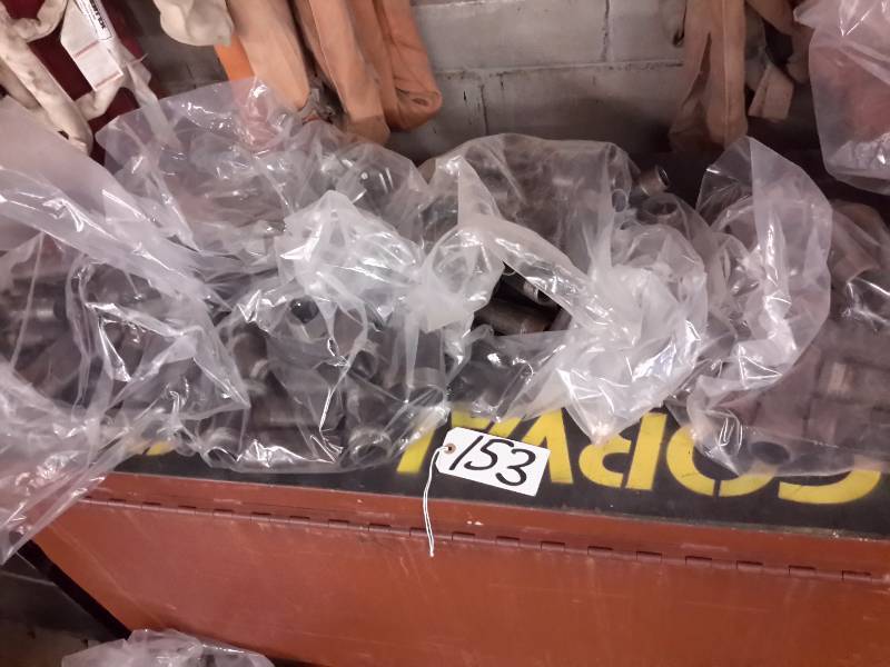 lot 153 image: Large lot of Cast Nipples.. Bag of Pipe hangers
