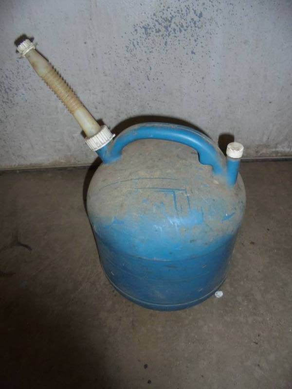 lot 64 image: Kerosene Container wappx 2 gallons of Kerosene