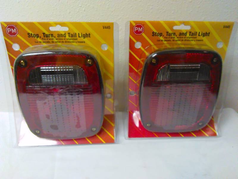 lot 14 image: Stop Turn and Taillight Pair (2) By Peterson