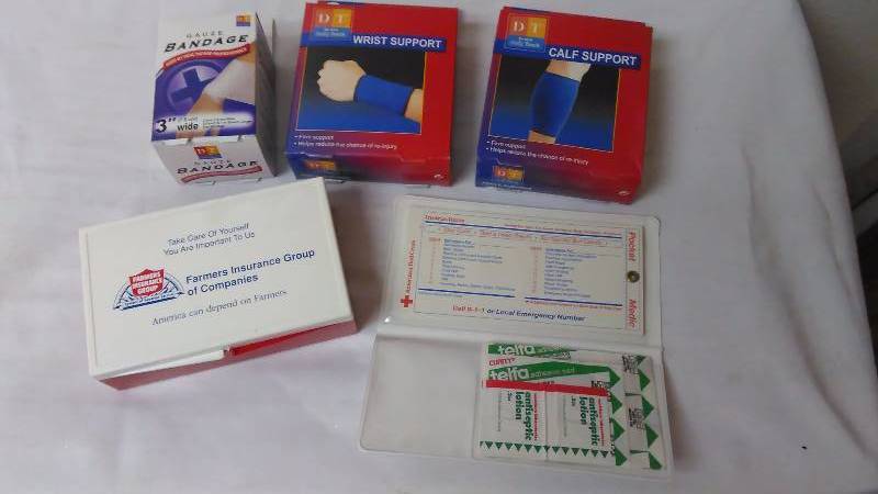 lot 122 image: Wrist and Calf Support, First Aide Supply Kits