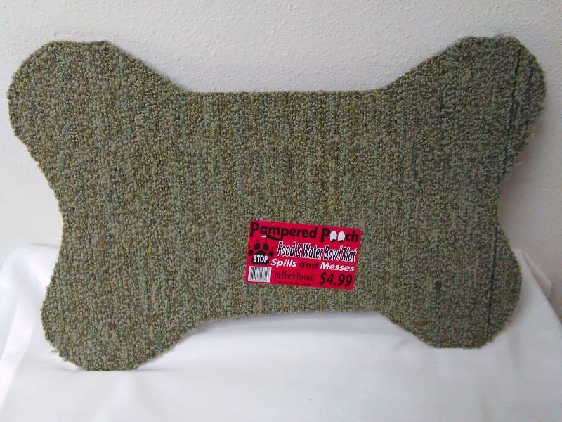 lot 251 image: Pet Bone Floor mat, Green, rubber backed, Measures 17 in. x 11 in.