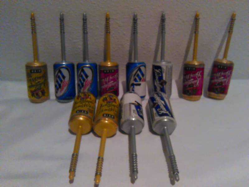 lot 300 image: Assorted Bobbers (12) Miller Lite, Leinenkugel