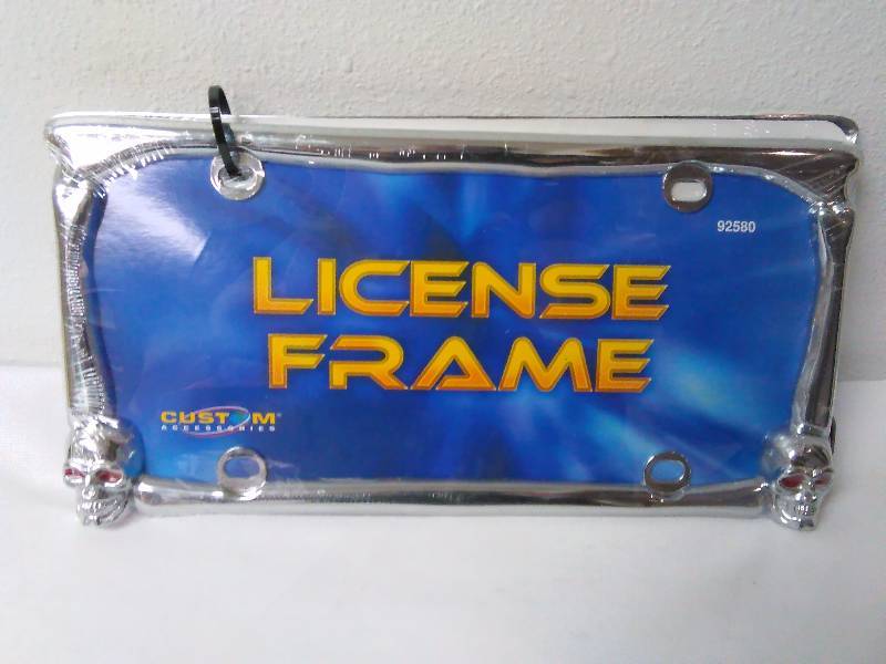 lot 343 image: License Frames, Red Eye Skeleton Head (2)
