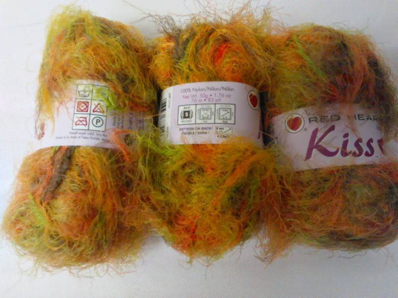 lot 544 image: Red Heart Kiss Yarn 83yds per skein, Fall Color (36 skein lot)