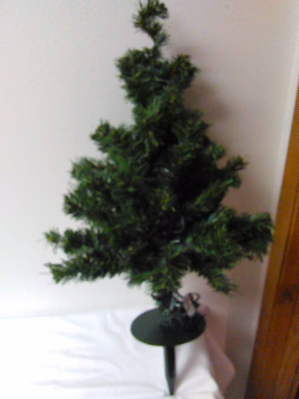 lot 678 image: 24 in Pre-lit Tree, outdoor ground stake  flower pot stake, white lights