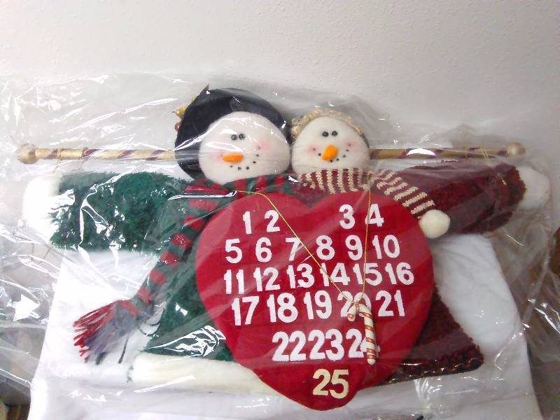 lot 775 image: Plush Snowman and Woman Advent Calendar, Simson Giftware