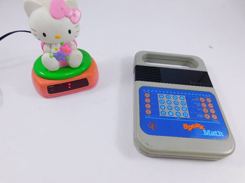lot 58 image: Vintage Speak & Math Learning Aid and Hello Kitty Alarm Clock - Both Work