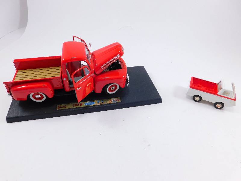 lot 74 image: Road Legends Die Cast 1948 Ford F1 Truck and Vintage Toy Tonka Truck