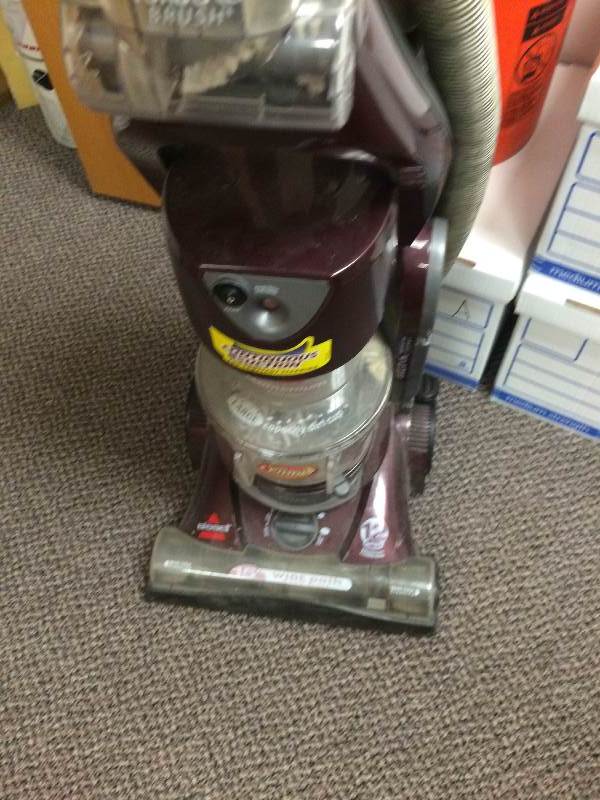 lot 27 image: Retails New $130 Bissell BagLess Upright Vacuum - Purple - Needs new belt (purchase at Target $5.00) and will work super
