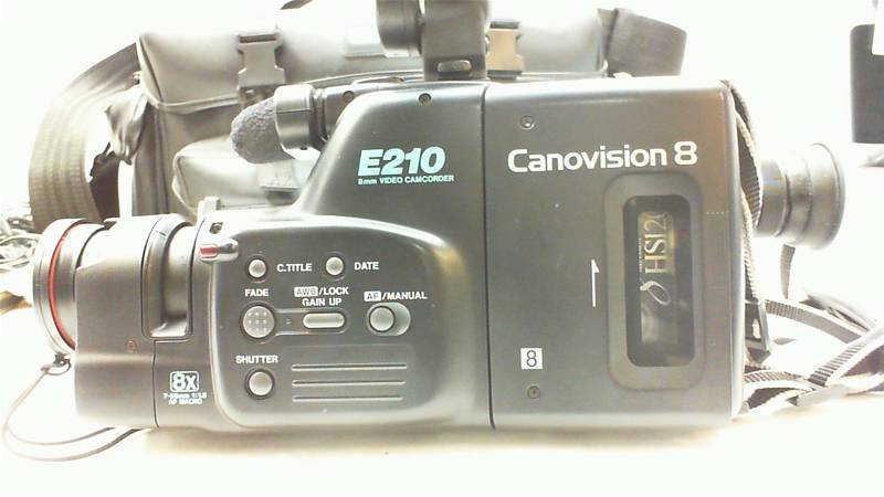 lot 42 image: Cannon Canovision 8 camera with extra batteries and non working charger