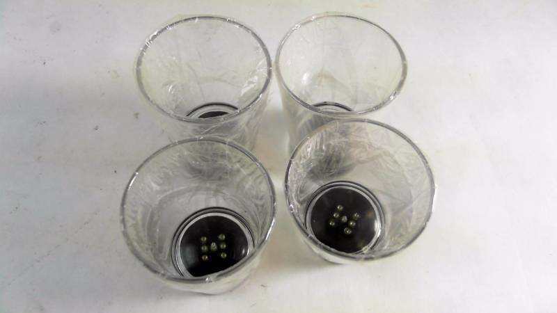 lot 655 image: 4 Light Up Shot Glasses