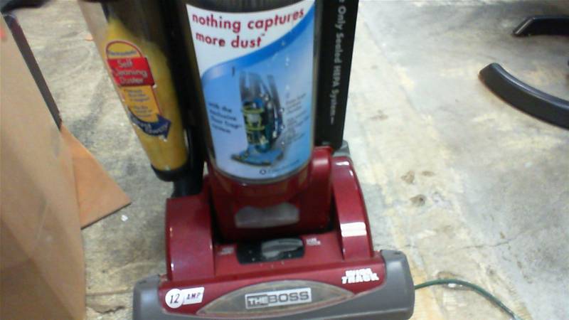 lot 496 image: Eureka model 5860 The Boss vacuum cleaner with attachments & duster