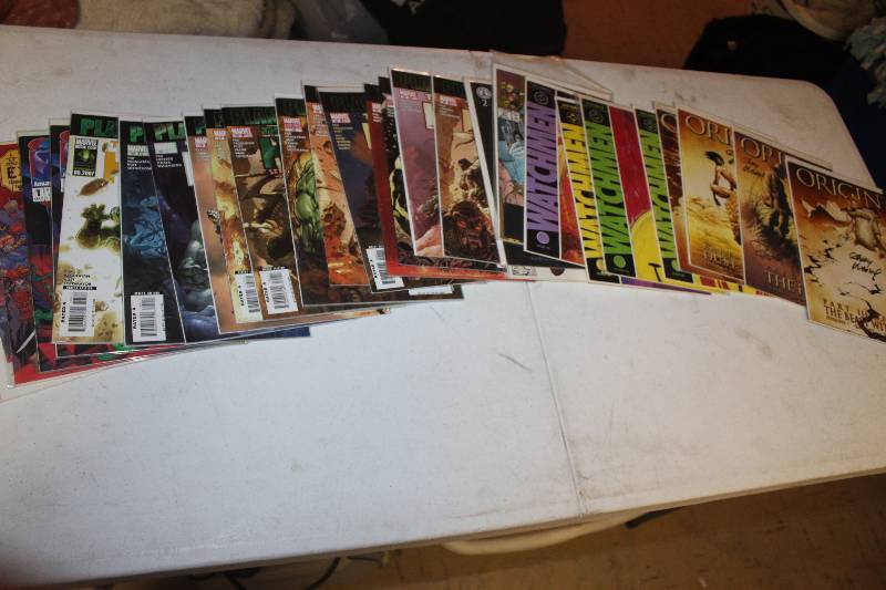 lot 10 image: Lot of (28) Comics Origin The Beast Within, Origin Heaven and Hell, Origin Hill, Origin Dust to Dust, Origin Revelation, Watchmen, Mutants, The Crow Dead Time, Fantastic Four, Hulk, Spawn, The League of Extraordinary Gentlemen Comic Books