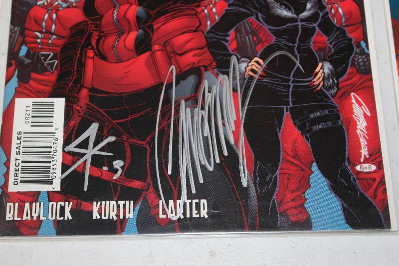 lot 2 image: Lot of (14) Signed DC, Marvel Comics GI Joe, Spider-man, House of M, Batman, New Exiles Comic Books