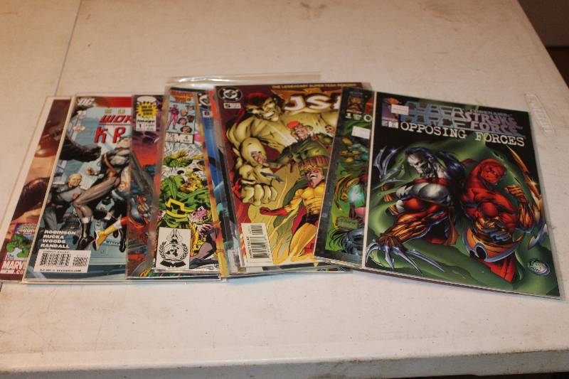lot 87 image: Lot of (14) Image, Marvel, Top Cow, DDP, DC Comics New Avengers, JSA, Stryke Force, Eberron, Comic Books