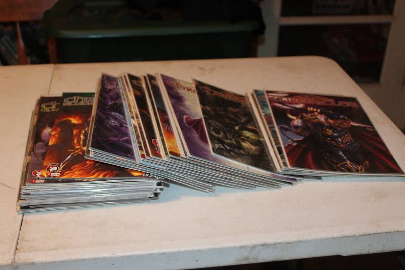 lot 88 image: Lot of (35) DDP Comics Chronicles Comic Books w Signed