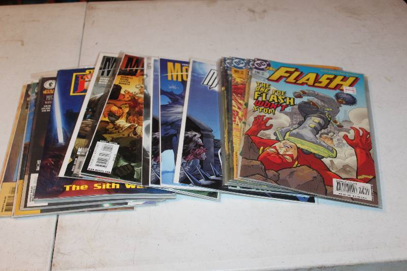 lot 101 image: Lot of (23) Marvel, DC Comics Flash, Moon Knight, Star Wars Comic Books