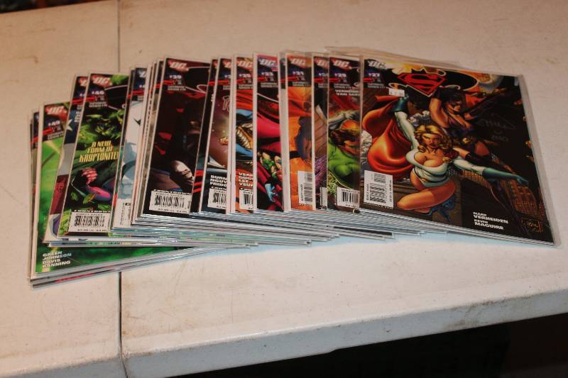 lot 109 image: Lot of (26) DC Comics Batman, Superman Comic Books w Signed