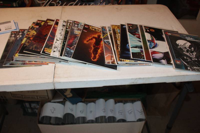 lot 114 image: Lot of (35) Top Cow, DC Comics Superman, Batgirl, Infinite Crisis, Rising Stars, And More Comic Books Signed w Certificate of Authenticity & Wizard World Chicago 2002 Signed