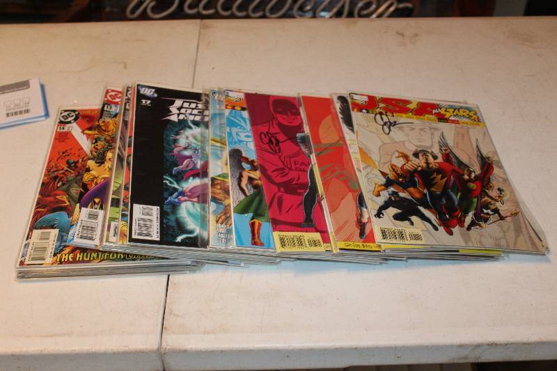lot 118 image: Lot of (30) DC Comics JSA All-stars Comic Books w Signed