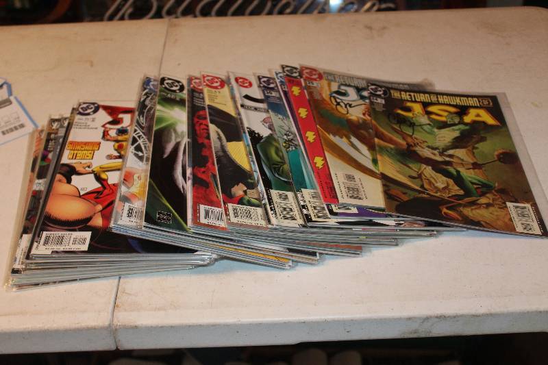 lot 119 image: Lot of (37) DC Comics JSA Comic Books