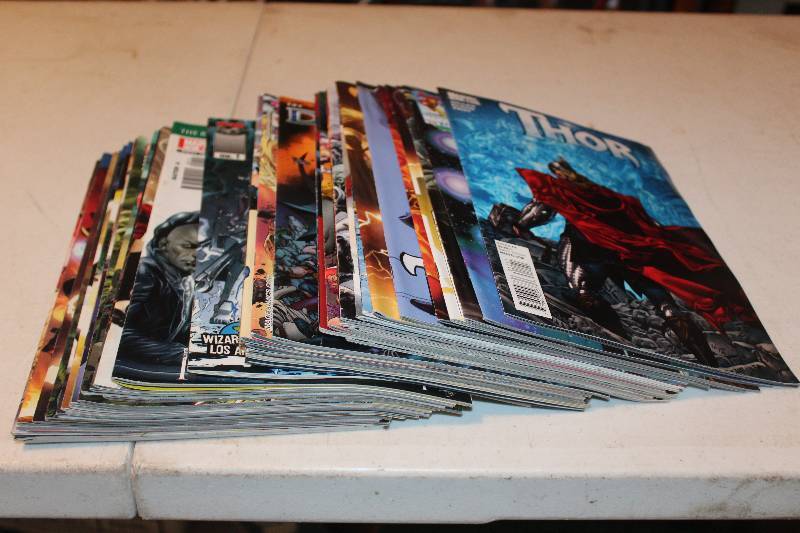 lot 122 image: Lot of (45) Marvel Comics Thor, New Avengers, X-Men Comic Books Some Have Raised Back Pages
