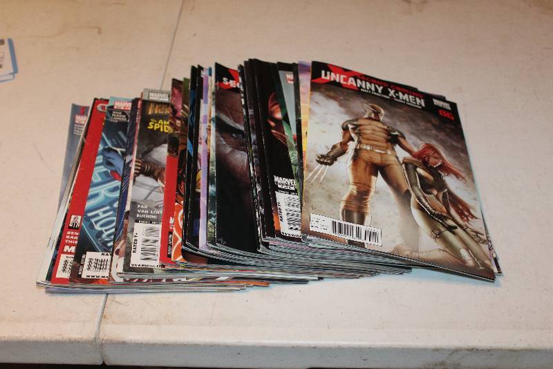lot 123 image: Lot of (47) Marvel Comics New Avengers, X-Men, Spider-man Comic Books w Signed