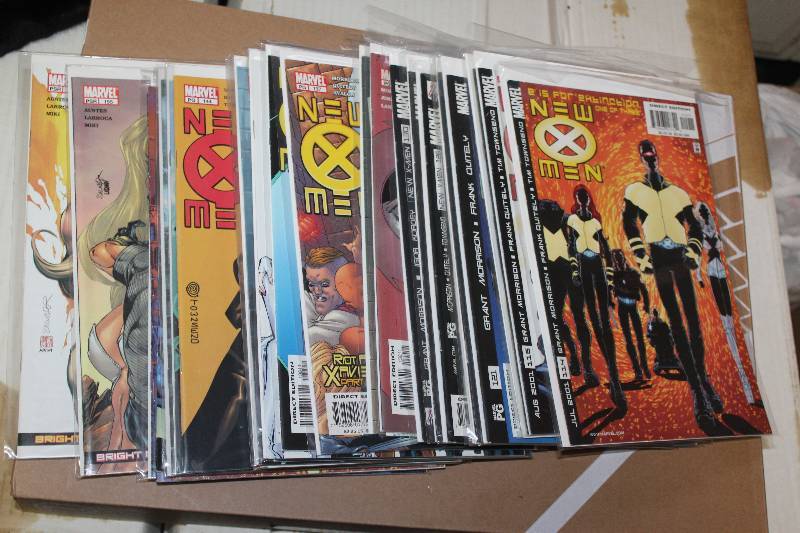 lot 151 image: Lot of (26) Marvel Comics New X-Men Comic Books w Sleeves