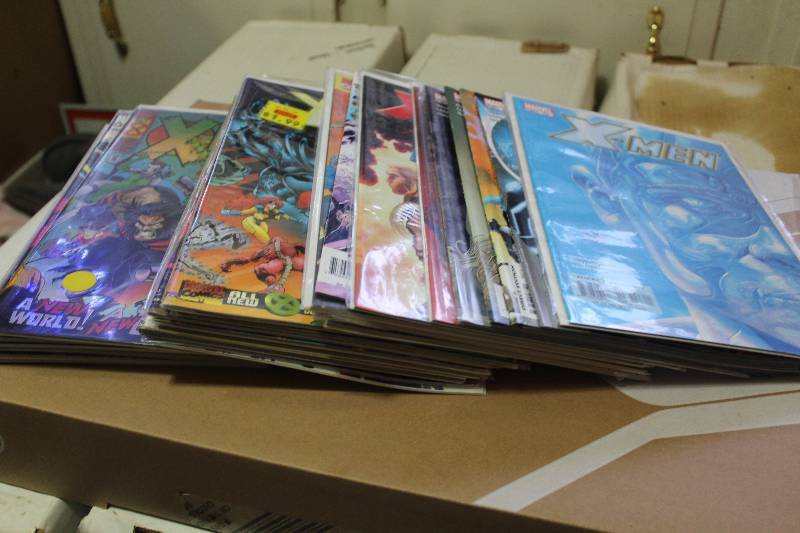 lot 152 image: Lot of (26) Marvel Comics X-Men Comic Books w Sleeves