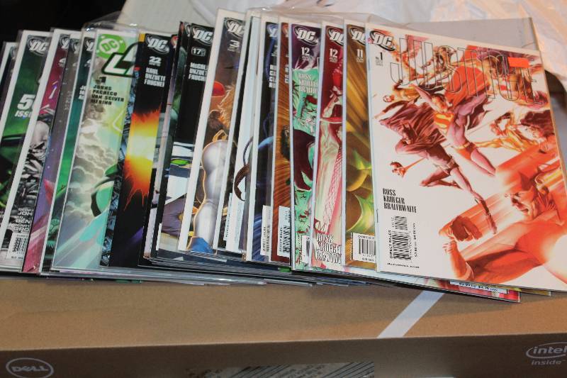 lot 163 image: Lot of (43) DC Comics Justice League, JSA, Titans, Robin, Green Lantern Comic Books w Sleeves