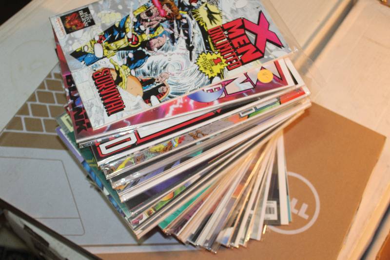 lot 212 image: Lot of (47) Marvel Comics X-Men Comic Books w Sleeves