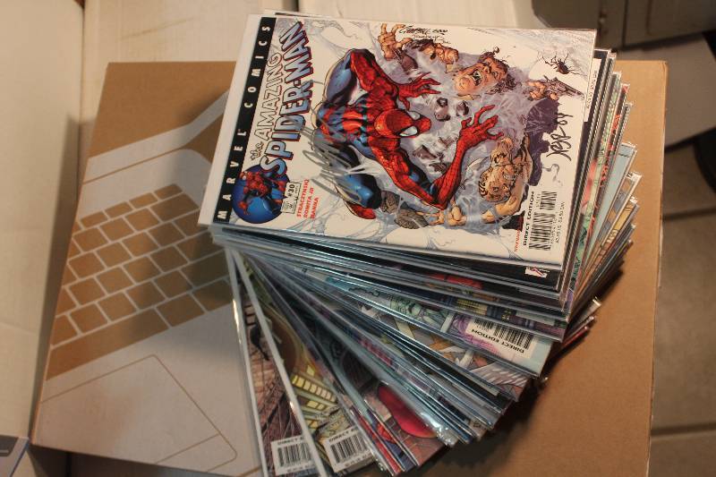 lot 239 image: Lot of (35) Marvel Comics Spider-man Comic Books w Signed, Sleeves