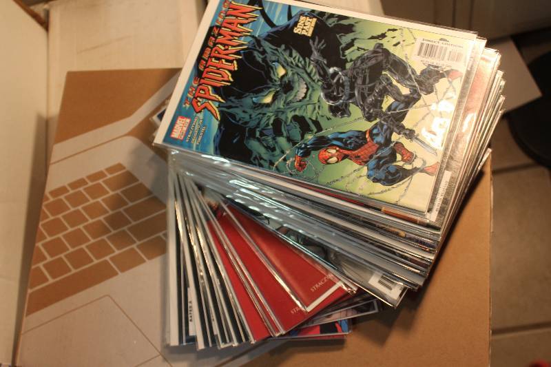 lot 240 image: Lot of (35) Marvel Comics Spider-man Comic Books w Sleeves