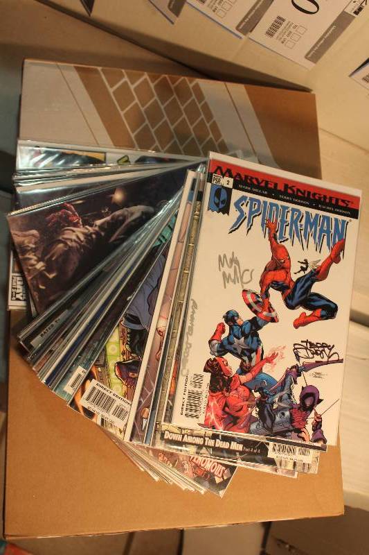 lot 243 image: Lot of (31) Marvel Comics Spider-man Comic Books w Signed, Sleeves