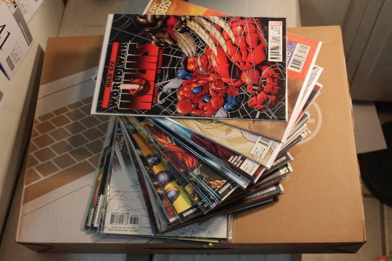 lot 247 image: Lot of (35) Marvel Comics X-Men, Avengers, Batman, Captain America, Hulk, JSA, And More Comic Books w Signed, Sleeves