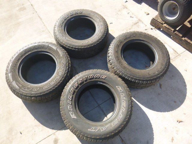 lot 106 image: 4 Bridgestone Dueler AT Tires