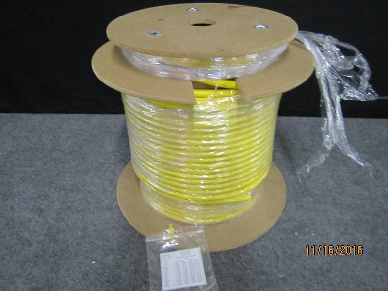 lot 64 image: New roll of fiber cable, part numbe...