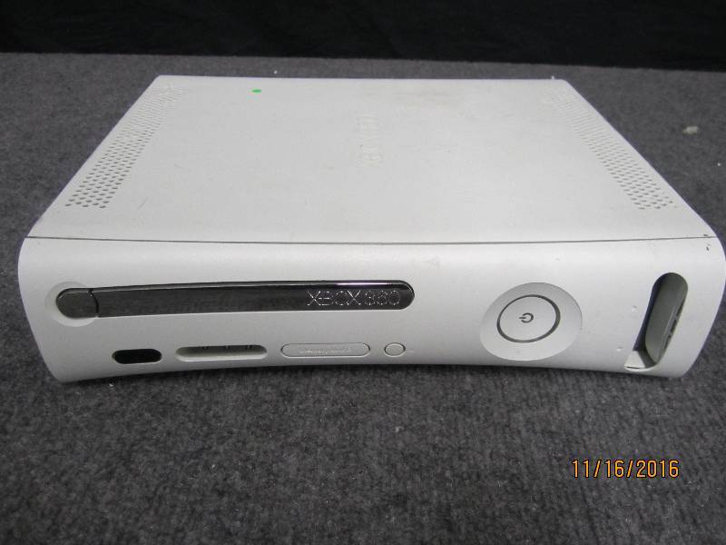 lot 16 image: X Box 360 powers on, sticky eject...
