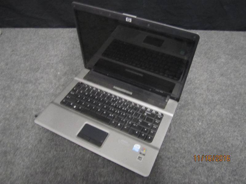 lot 110 image: HP Compaq 6720s laptop computer, wo...