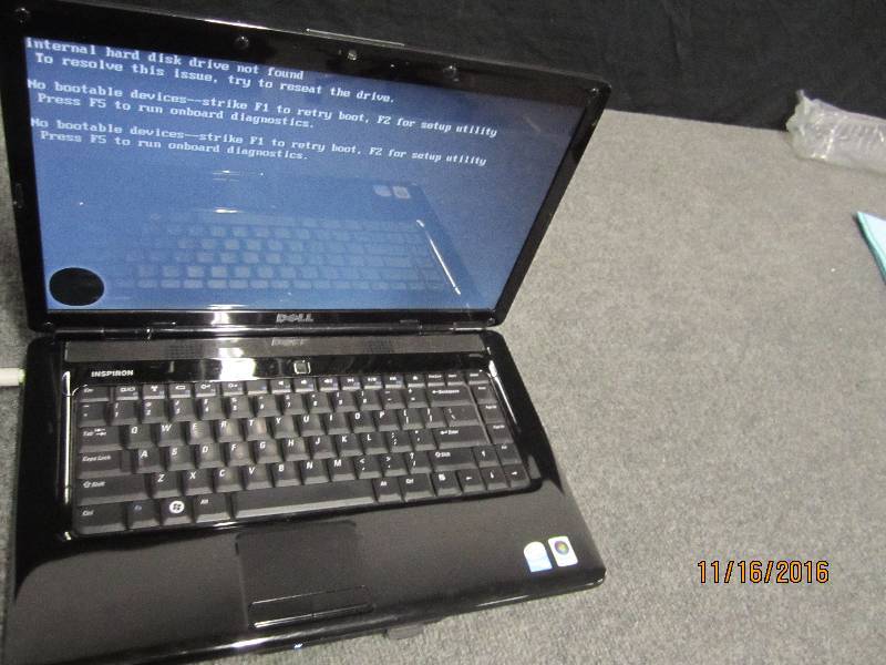 lot 144 image: Dell Inspiron bad screen, powers on...